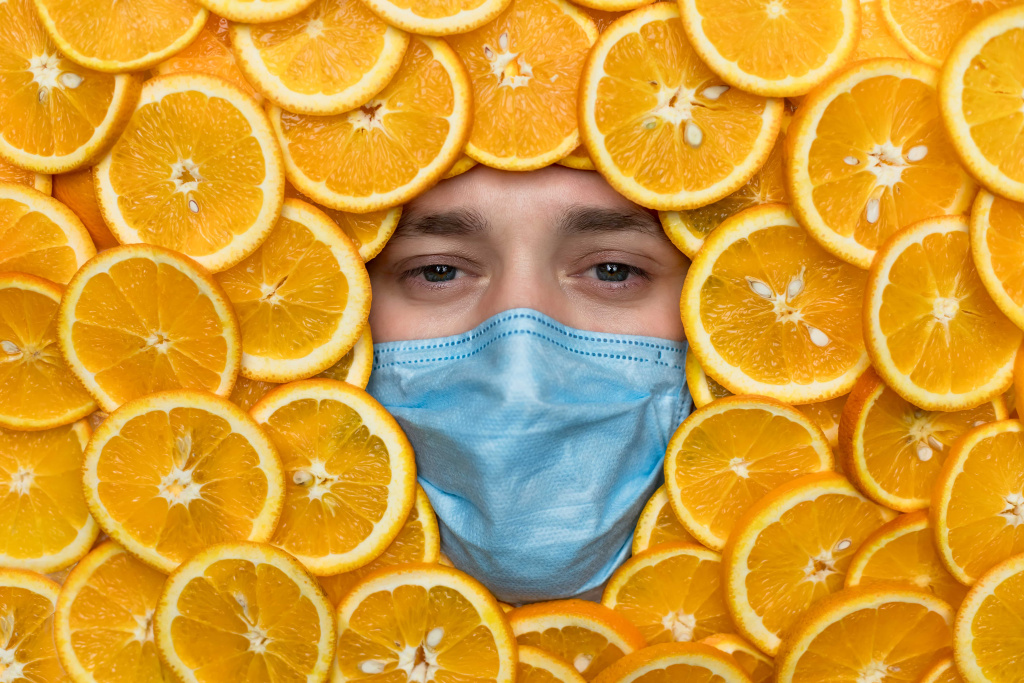 face-man-oranges-medical-mask-vitamin-c-is-cold-medicine-doctor-mask (1).jpg